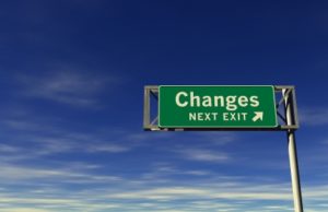 Image of a green exit sign, reading "Changes, next exit". 